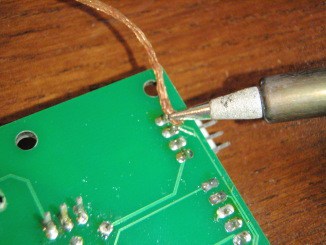 Desolder using a solder wick
