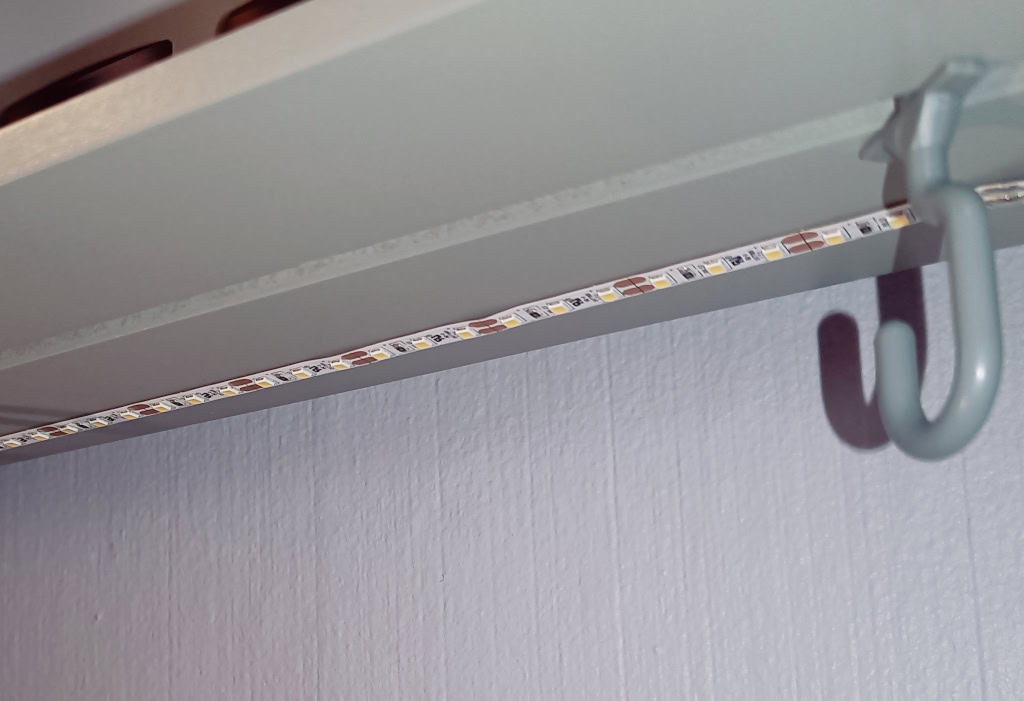 LED-strip attached to toy kitchen
